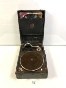 A VINTAGE WIND UP PORTABLE GRAMOPHONE, AND RECORDS.