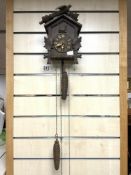 BLACK FOREST CUCKOO CLOCK WITH WEIGHTS.