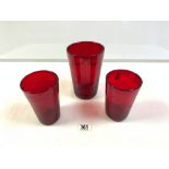 THREE 1960s RUBY RED GLASS VASES, 19.5 CMS TALLEST.