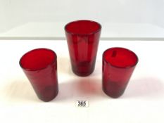 THREE 1960s RUBY RED GLASS VASES, 19.5 CMS TALLEST.