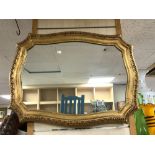 REPRODUCTION SHAPED GILT WALL MIRROR, 82X62 CMS.