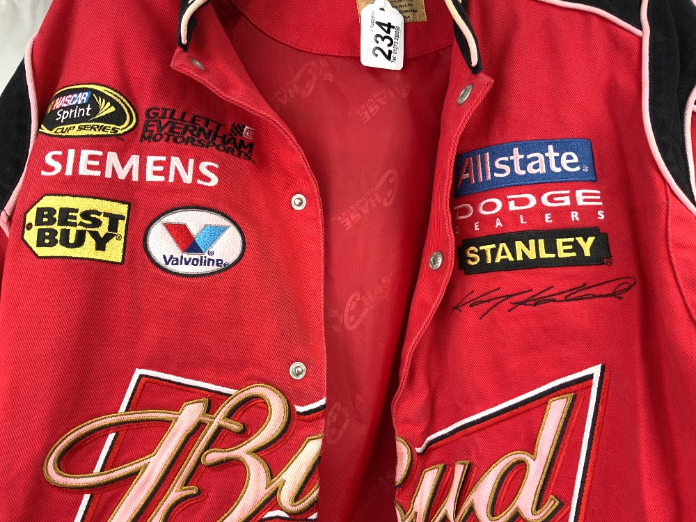 A CHASE DRIVERS LINE RED JACKET WITH SPONSORS LOGOS. SIZE M. - Image 2 of 4