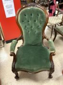 VICTORIAN UPHOLSTERED BUTTON BACK SHOWOOD MAHOGANY OPEN ARMCHAIR, ON CABRIOLE LEGS.