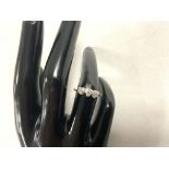 18 CARAT GOLD AND PLATINUM RING DECORATED WITH THREE DIAMONDS SET AS LOVE HEARTS SIZE L