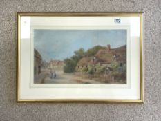 J MUIR WATERCOLOUR DRAWING - VILLAGE STREET SCENE WITH FIGURES AND COTTAGES SIGNED FRAMED AND GLAZED