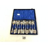 A SET OF TWELVE SWEDISH MARKED ORNATE SILVER TEA SPOONS AND CASE. 284 GMS.