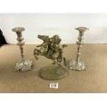 HEAVY CAST BRASS MODEL OF CAVALIER ON HORSEBACK, 24 CMS, AND A PAIR OF SILVER PLATED CANDLESTICKS.