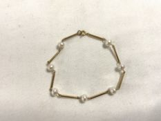 9K GOLD AND PEARL BRACELET