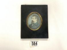 A 19TH-CENTURY OVAL PORTRAIT MINATURE OF A GENT, IN A FRAME.