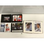 THREE PHOTO ALBUMS OF FORMER FORMULA 1 DRVERS ETC, ALAIN PROST, EDDIE IRVINE, MIKKA HAKINNEN AND