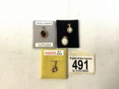 FOUR GOLD PENDANTS WITH TWO FIRE OPALS AND TWO WITH GARNETS