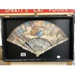 ANTIQUE FOLDING BONE FAN, WITH PAINTED-ON-PAPER SCENE OF HELIOS RIDING A CHARIOT OF THE SUN. CASED