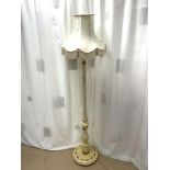 A PAINTED FLUTED COLUMN LAMP STAND AND SHADE.