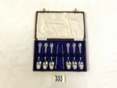 SET OF SIX STERLING SILVER COFFEE SPOONS & MATCHING TONGS, WITH EMBOSSED FLORAL DECORATION, MAKER
