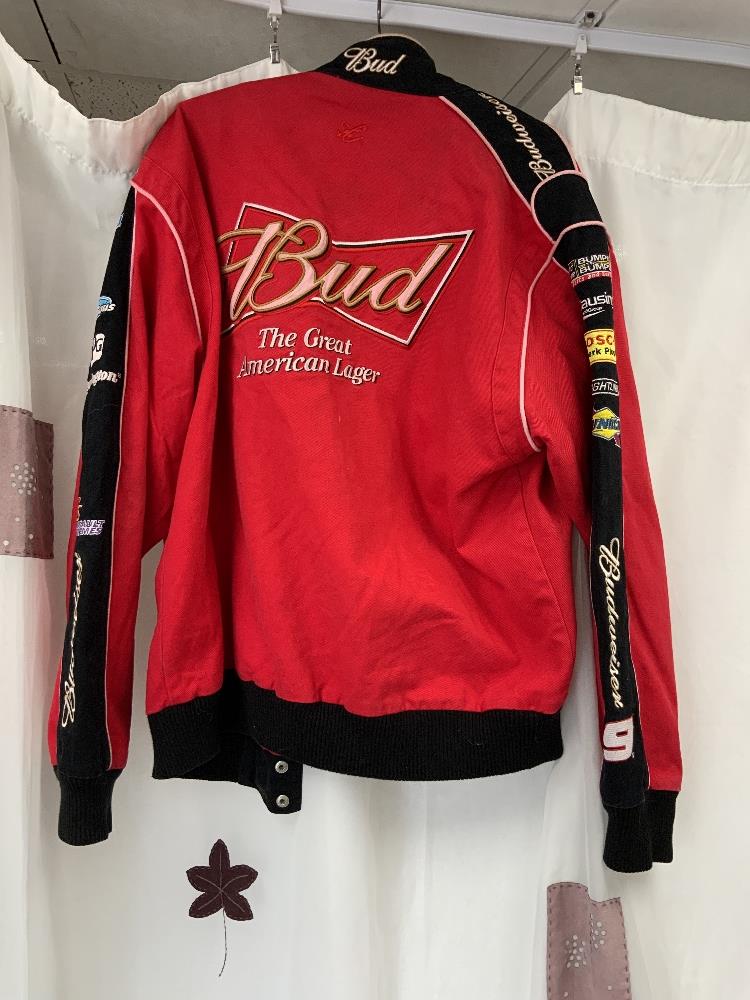 A CHASE DRIVERS LINE RED JACKET WITH SPONSORS LOGOS. SIZE M. - Image 4 of 4
