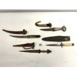 ARABIAN DAGGER WITH AGATE AND STONE HANDLE AND SCABBARD, ARABIAN HORN HANDLE DAGGER, AND TWO OTHER