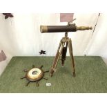 VINTAGE BRASS AND LEATHER TELESCOPE WITH A SHIPS WHEEL SHAPED BAROMETER