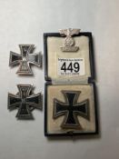 TWO GERMAN FIRST WORLD WAR 1914 IRON CROSSES, 28 AND 31 GMS, A GERMAN 1939 SECOND WORLD WAR IRON