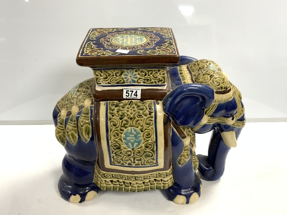 A 20 CENTURY CERAMIC ELEPHANT STOOL, 43 CMS.