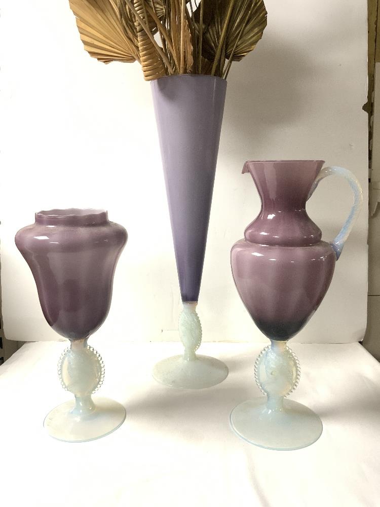 AMETHYST GLASS EWER JUG WITH OPALESCENT BASE WITH EMBOSSED LADIES HEAD, 36 CMS, AND TWO MATCHING - Image 2 of 4