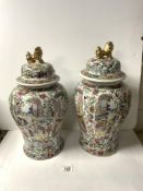 PAIR OF CHINESE CANTON FAMILLE ROSE BALLUSTER VASES AND COVERS, 46 CMS.