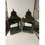 A PAIR OF METAL MIRRORED BACK WALL MOUNTED CANDLE LANTERN LIGHTS, 28X58 CMS.