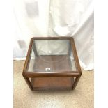 1970s TEAK AND GLASS TOP COFFEE TABLE, 54X46 CMS.