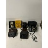 VINTAGE KODAK BROWNIE REFLEX CAMERA IN BOX, TWO VINTAGE KODAK POCKET CAMERAS AND TWO OTHER CAMERAS.