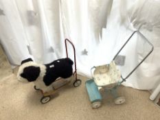 A VINTAGE NYLENA PUSH AND RIDE ALONG TOY DOG, AND A DOLLS PRAM.