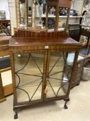 A 1930s GLAZED MAHOGANY DISPLAY CABINET ON BALL AND CLAW FEET, 88X32X122 CMS.