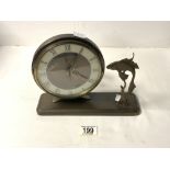 ART DECO SPELTER STLYIZED FISH MOUNTED CIRCULAR ELECTRIC MANTEL CLOCK.
