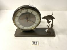 ART DECO SPELTER STLYIZED FISH MOUNTED CIRCULAR ELECTRIC MANTEL CLOCK.