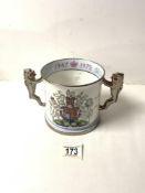 A PARAGON PORCELAIN COMMEMORATIVE 2-HANDLE LOVING CUP - SILVER WEDDING QUEEN ELIZABETH AND DUKE OF