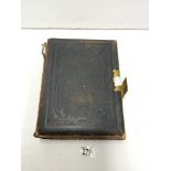 LEATHER FAMILY BIBLE WITH ILLUSTRATIONS.