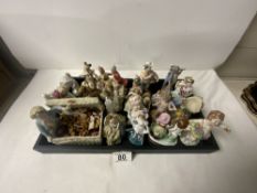 A VOLKSTEDT PORCELAIN CHERUB FIGURE HOLDING FLOWERS AND OTHER CONTINENTAL PORCELAIN FIGURES, 14