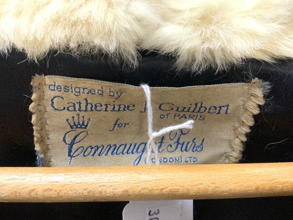 A VINTAGE WHITE SPOTTED FUR COAT BY CONNAUGHT FURS, DESIGNED BY CATHERINE GUILBERT OF PARIS. - Image 5 of 6