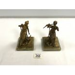 PAIR OF FRENCH GILT BRONZE LADY FIGURAL BOOKENDS ON ONYX BASES, 16 CMS. [ ONE WITH MISSING HAND ].