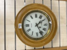 A FRENCH CIRCULAR PINE WALL CLOCK WITH PAINTED DIAL - STRITTER- PONT AUDEMER. 38 CMS DIAMETER.
