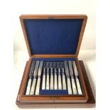 SET OF MOTHER O PEARL AND PLATED KNIVES AND FORKS IN MAHOGANY CASE, AND EMPTY MAHOGANY CUTLERY