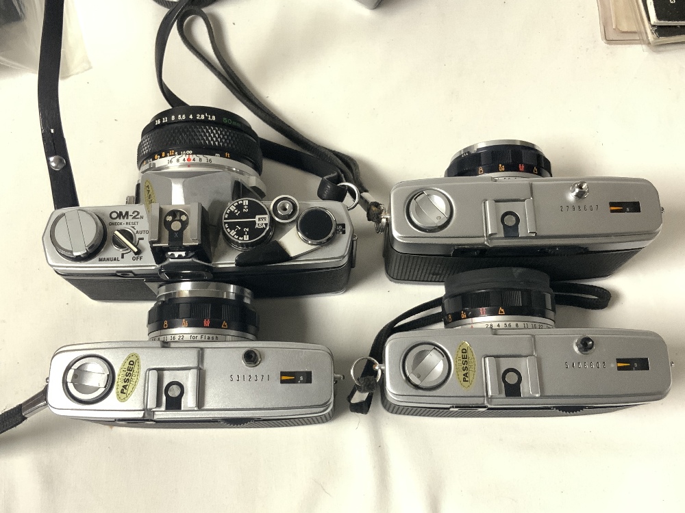 OLYMPUS OM-2 CAMERA, TWO OLYMPUS TRIP 35 CAMERAS, AND OLYMPUS 75 - 150 MM LENSE AND OTHER - Image 4 of 6