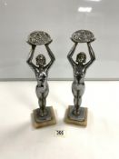 PAIR OF FRENCH ART DECO CHROME FIGURES OF LADIES HOLDING FLOWER BASKETS, ON MARBLE BASES, SIGNED