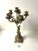 ORNATE BRASS 6-BRANCH FIGURAL SUPPORT CANDELABRUM, 42 CMS.