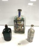 FOLK ART DIORAMA OF A MINING SCENE WOODEN FIGURE IN A GLASS BOTTLE ALSO WITH TWO OTHER BOTTLES