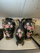 PAIR OF LATE VICTORIAN ROSE PATTERN TWO HANDLE VASES, 38CMS, AND A MATCHING JUG.