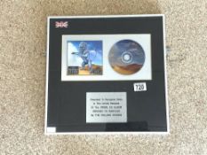 ROLLING STONES CD ALBUM BRIDGES TO BABYLON, FRAMED AND PRESENTED TO RECOGNISE SALES IN THE UK .
