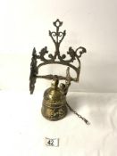 WALL MOUNTED ORNATE BRASS BELL.