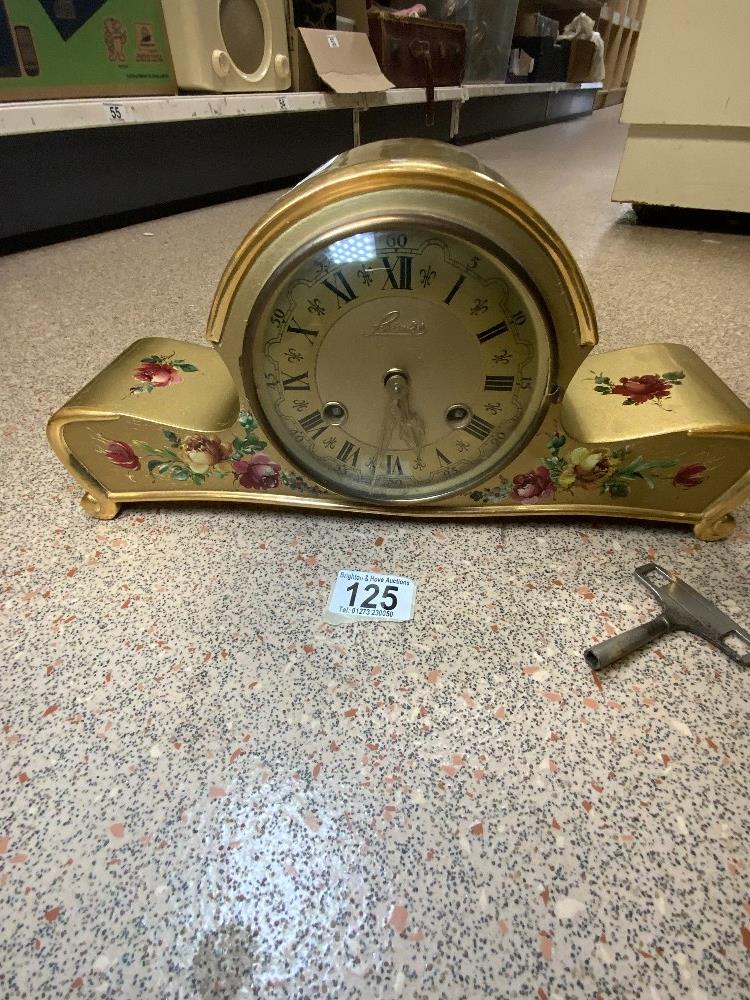 A 1950s GOLD AND FLORAL DECORATED MANTEL CLOCK BY SCHLENKER. - Image 2 of 4