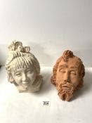 TWO SCULPTED CLAY HEADS OF A GIRL AND A BEARDED MAN.