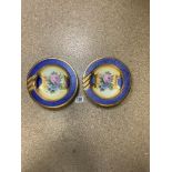 A PAIR OF BLUE, GOLD AND FLORAL DECORATED DISHES - BY MTC ITALY, 21 CMS DIAMETER.