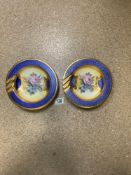 A PAIR OF BLUE, GOLD AND FLORAL DECORATED DISHES - BY MTC ITALY, 21 CMS DIAMETER.